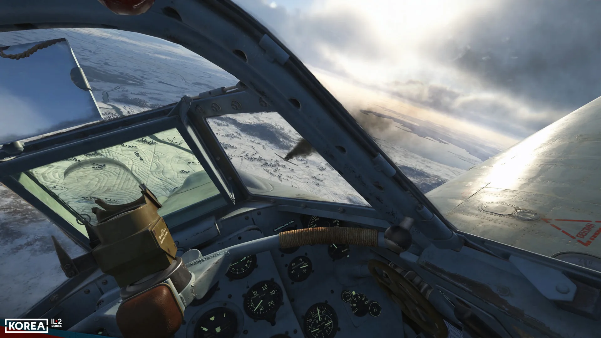Korea. IL-2 Series, Soviet cockpit with Cyrillic dials over a snow-covered Korea